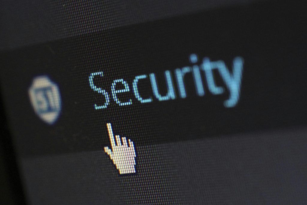 security-protection-anti-virus-software-60504-60504 Close-up view of a mouse cursor over digital security text on display.